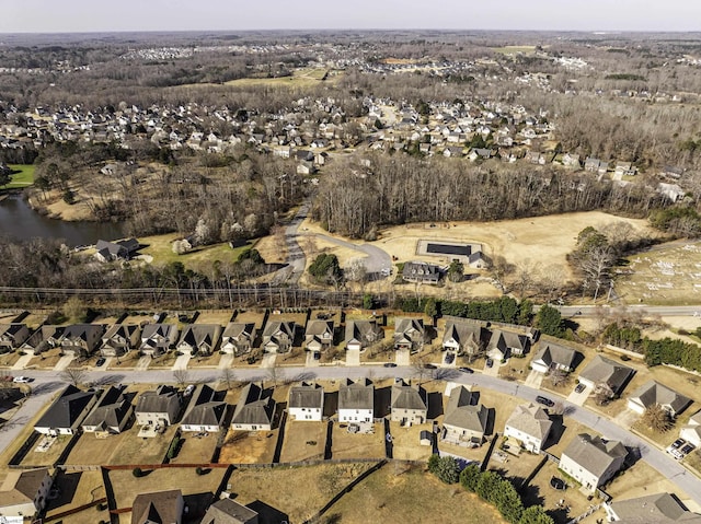 birds eye view of property with a residential view