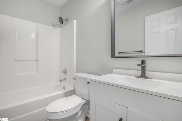 full bath featuring visible vents, toilet, a textured ceiling, bathtub / shower combination, and vanity