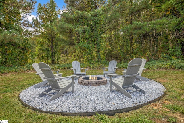 view of patio featuring a fire pit