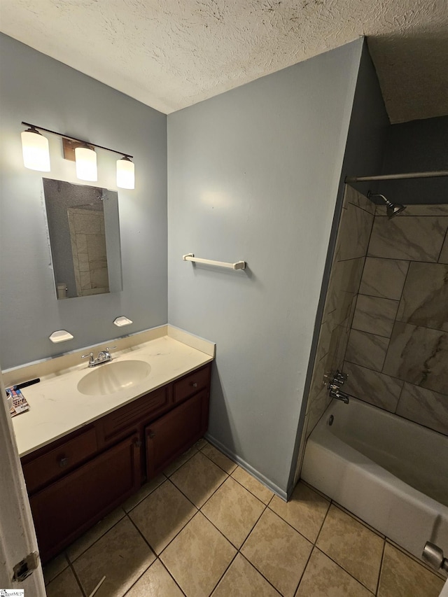 bathroom with vanity, tile patterned floors, bathing tub / shower combination, and a textured ceiling