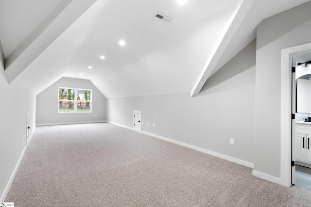 bonus room with carpet flooring, recessed lighting, baseboards, and lofted ceiling