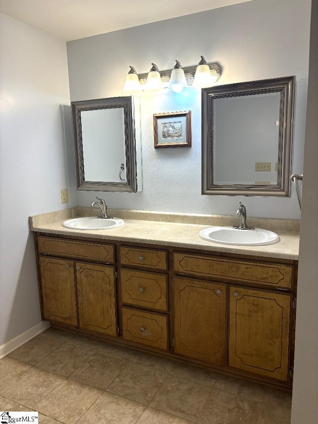 full bathroom with double vanity and a sink