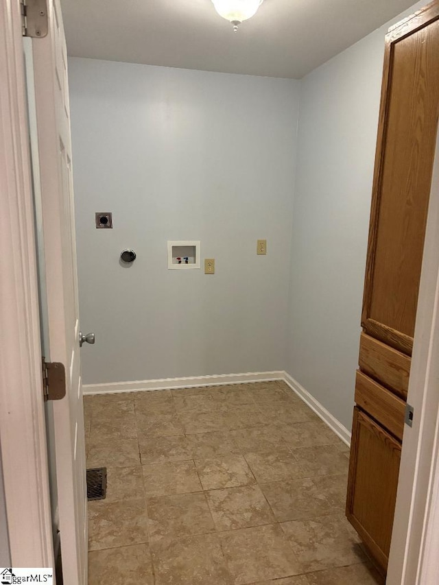 laundry area with visible vents, baseboards, laundry area, hookup for a washing machine, and hookup for an electric dryer