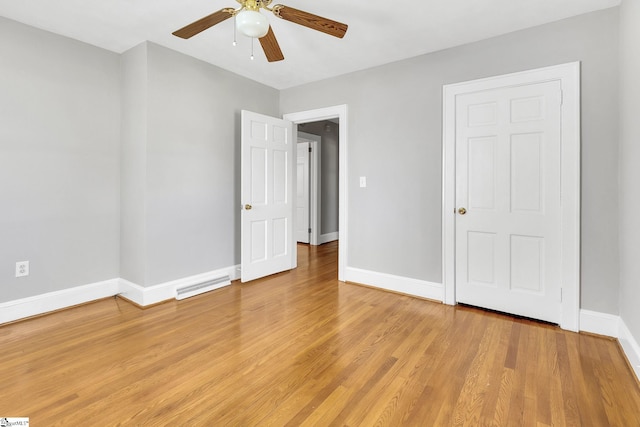 unfurnished bedroom featuring visible vents, baseboards, light wood finished floors, and ceiling fan