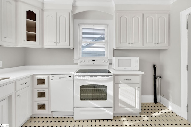 laundry room featuring baseboards and laundry area