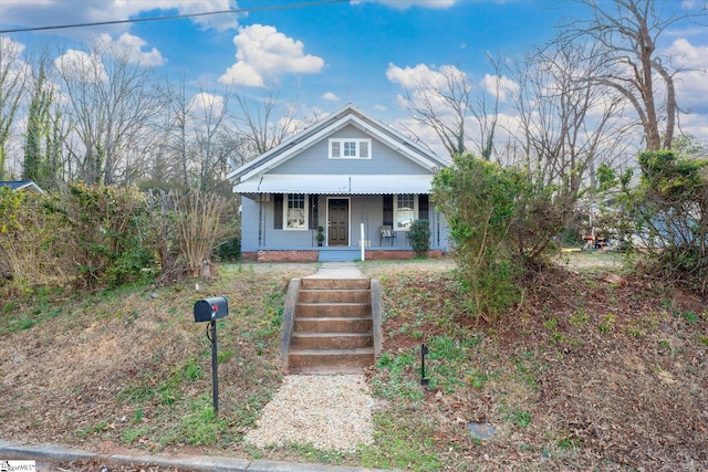 bungalow-style home with covered porch