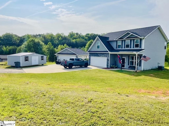 traditional-style home with a garage, driveway, and a front lawn