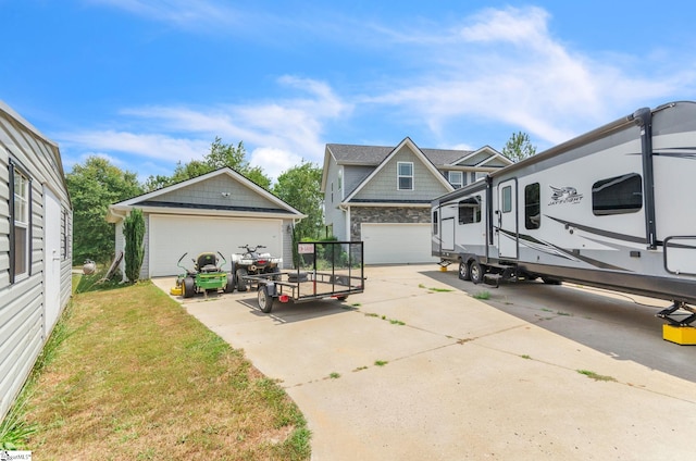 exterior space with an outbuilding and a garage