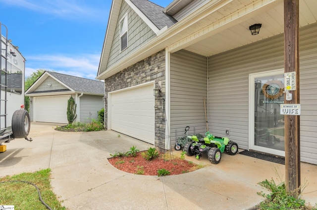 exterior space featuring a garage, stone siding, and roof with shingles