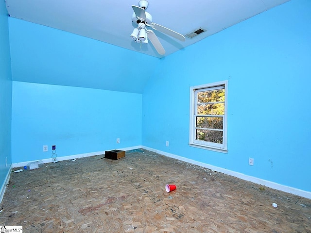 additional living space featuring visible vents, baseboards, and ceiling fan