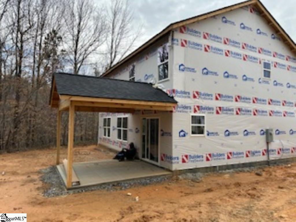 view of front of home with a patio area