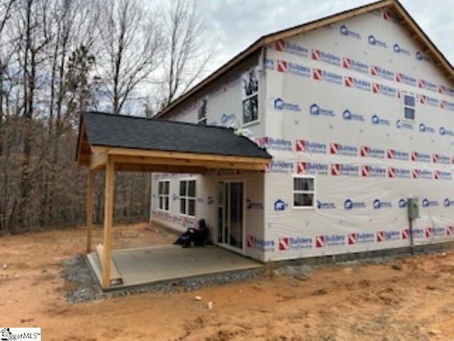 view of front of home with a patio area