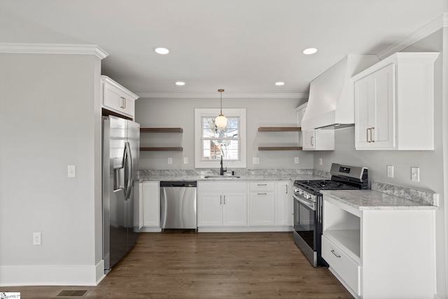 kitchen with premium range hood, a sink, stainless steel appliances, and open shelves