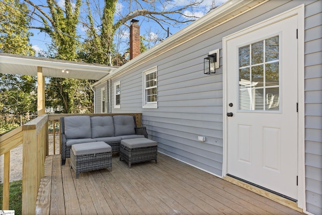 wooden deck featuring an outdoor hangout area