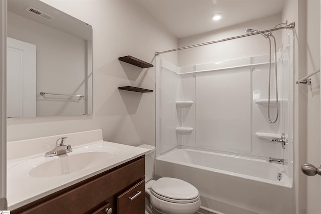 bathroom with vanity,  shower combination, toilet, and visible vents