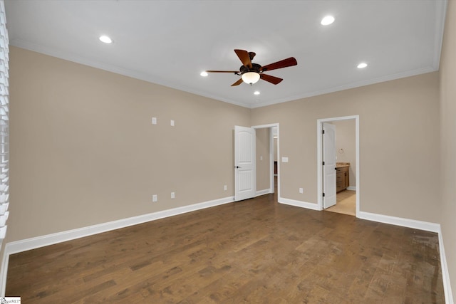 unfurnished bedroom with baseboards, wood finished floors, and crown molding