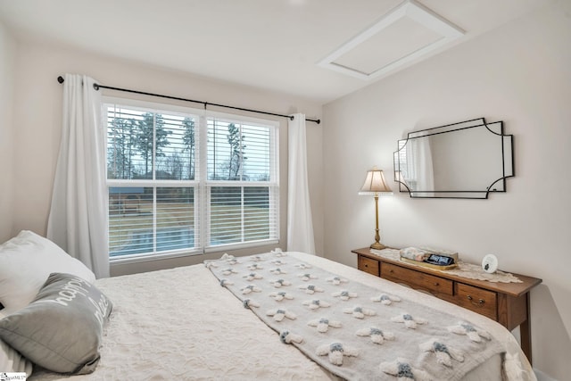 bedroom with attic access