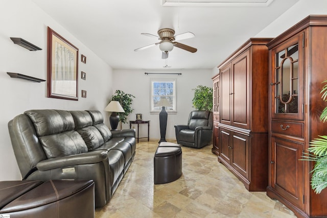 living area featuring ceiling fan