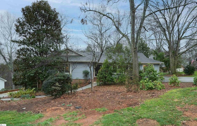 exterior space with brick siding