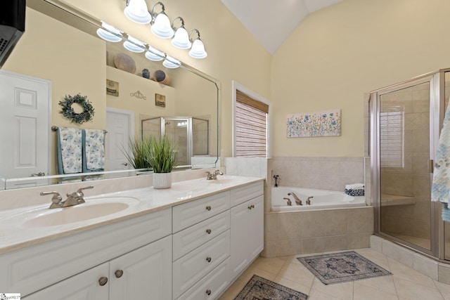 full bath with lofted ceiling, a stall shower, tile patterned floors, and a sink