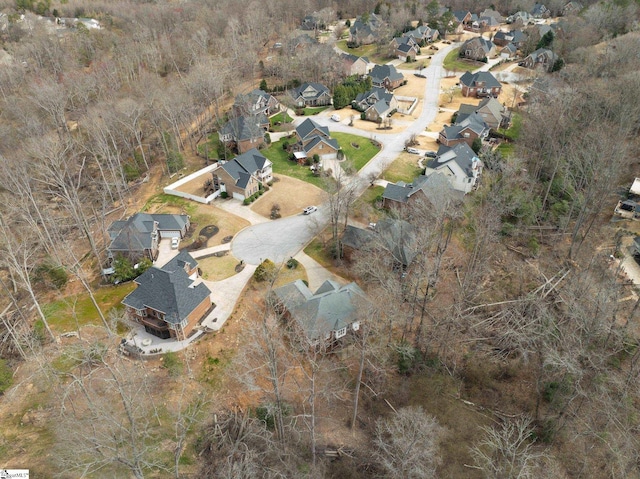 birds eye view of property with a residential view