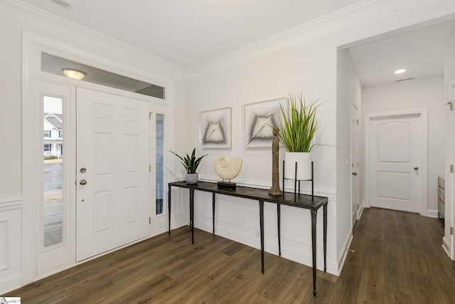 entryway with baseboards, dark wood-style flooring, and ornamental molding