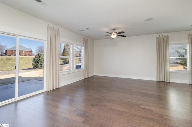 100 Outback Dr, Greer, SC 29650 - unfurnished room featuring visible vents, a ceiling fan, dark wood-style flooring, and baseboards