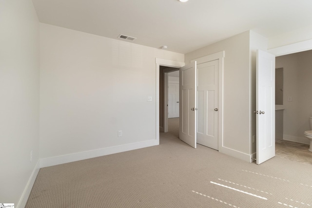 100 Outback Dr, Greer, SC 29650 - unfurnished bedroom featuring light carpet, visible vents, and baseboards
