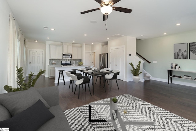 100 Outback Dr, Greer, SC 29650 - living area featuring baseboards, stairs, recessed lighting, dark wood-style floors, and a ceiling fan