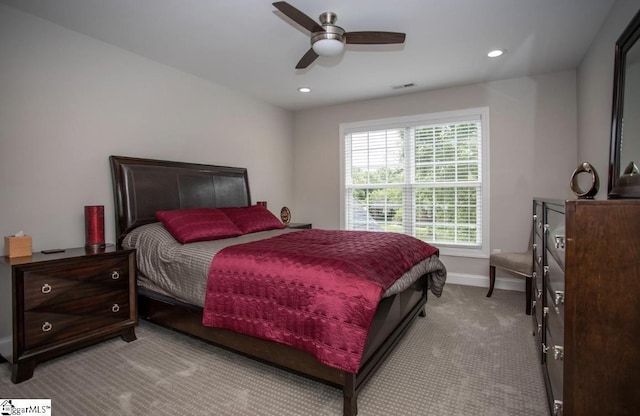 bedroom with a ceiling fan, visible vents, baseboards, recessed lighting, and carpet flooring