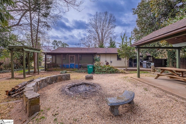 exterior space featuring a patio area and fence