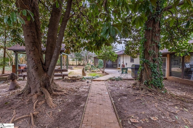 view of yard featuring a wooden deck