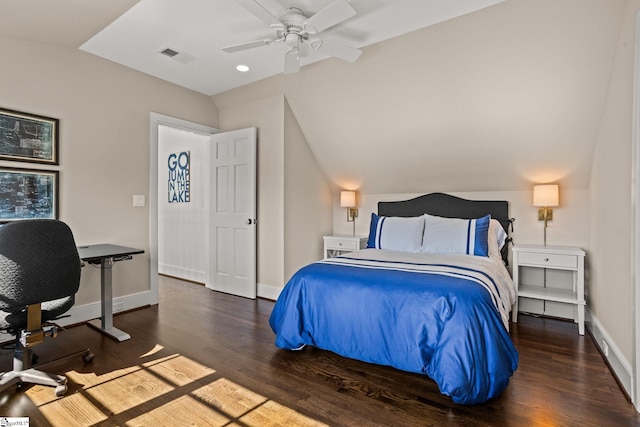 bedroom with visible vents, wood finished floors, baseboards, ceiling fan, and vaulted ceiling