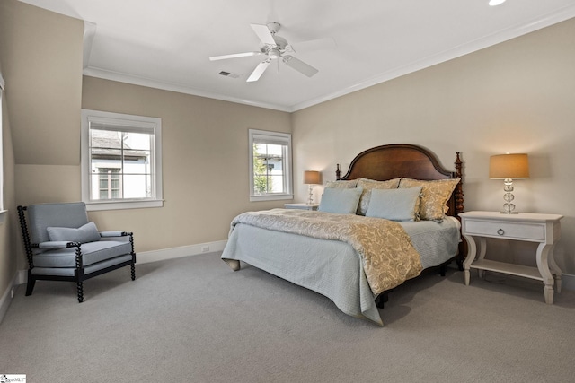 carpeted bedroom with ceiling fan, baseboards, visible vents, and ornamental molding