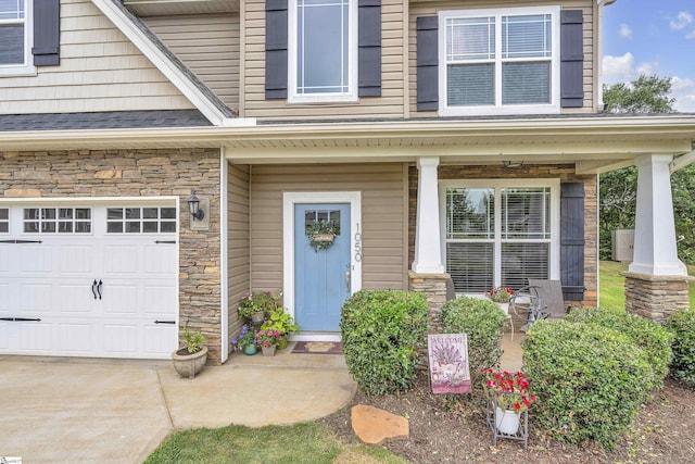 property entrance featuring stone siding and a porch