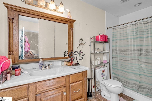 bathroom with a shower with shower curtain, toilet, and vanity