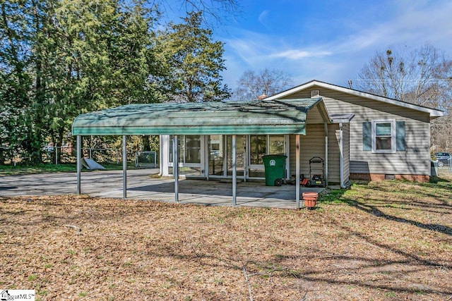 exterior space featuring a patio area and crawl space