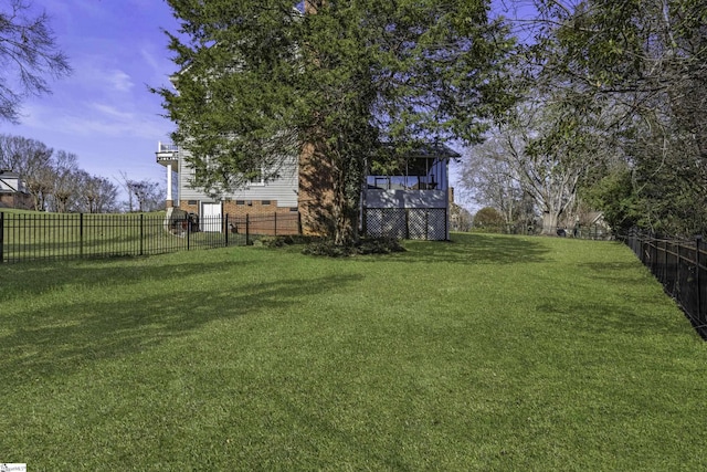 view of yard featuring a fenced backyard