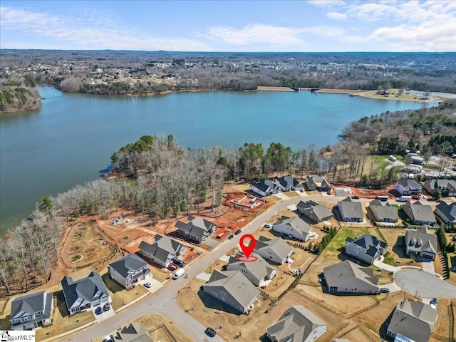 birds eye view of property featuring a residential view and a water view