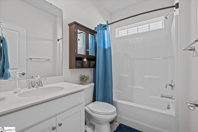 bathroom with vanity, toilet, and shower / tub combo with curtain