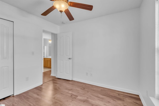 unfurnished bedroom featuring light wood-type flooring, baseboards, and ceiling fan