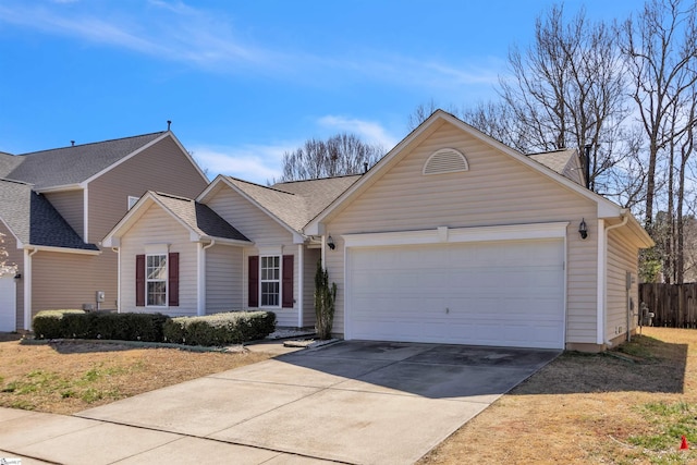 ranch-style house featuring driveway, roof with shingles, a garage, and fence