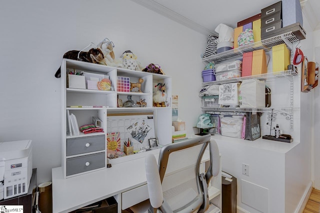 office area featuring crown molding