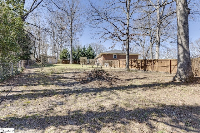 view of yard featuring a fenced backyard