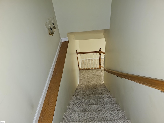 stairs featuring baseboards