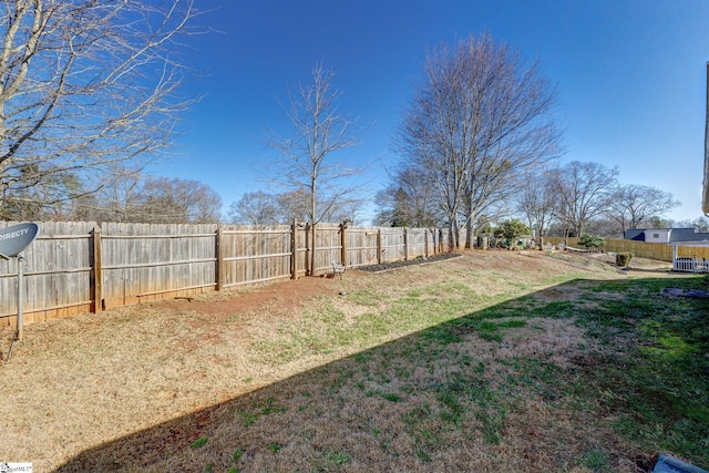 view of yard featuring a fenced backyard