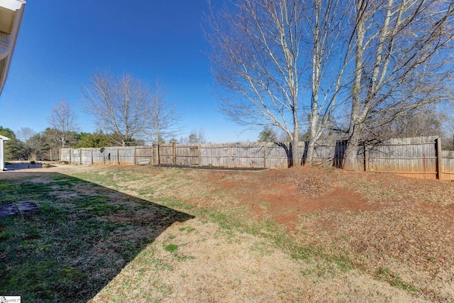 view of yard featuring a fenced backyard