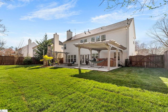 rear view of property featuring a gate, a fenced backyard, a pergola, a patio area, and a lawn