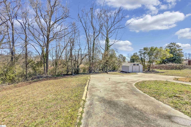 view of road with driveway