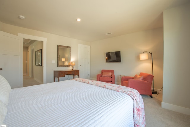 bedroom featuring recessed lighting, baseboards, and light carpet